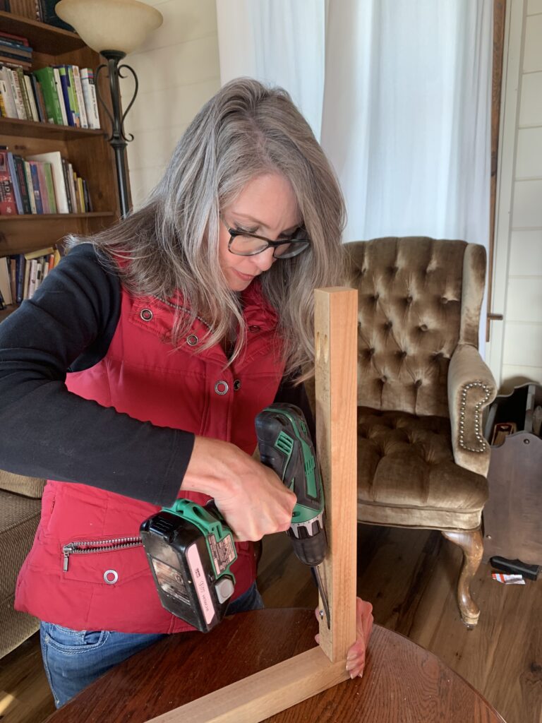 Stephanie Ray attaching wood 2x2 pieces with pocket screws